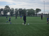Laatste training S.K.N.W.K. JO10-1 (partijtje tegen de ouders) van woensdag 22 mei 2024 (27/133)